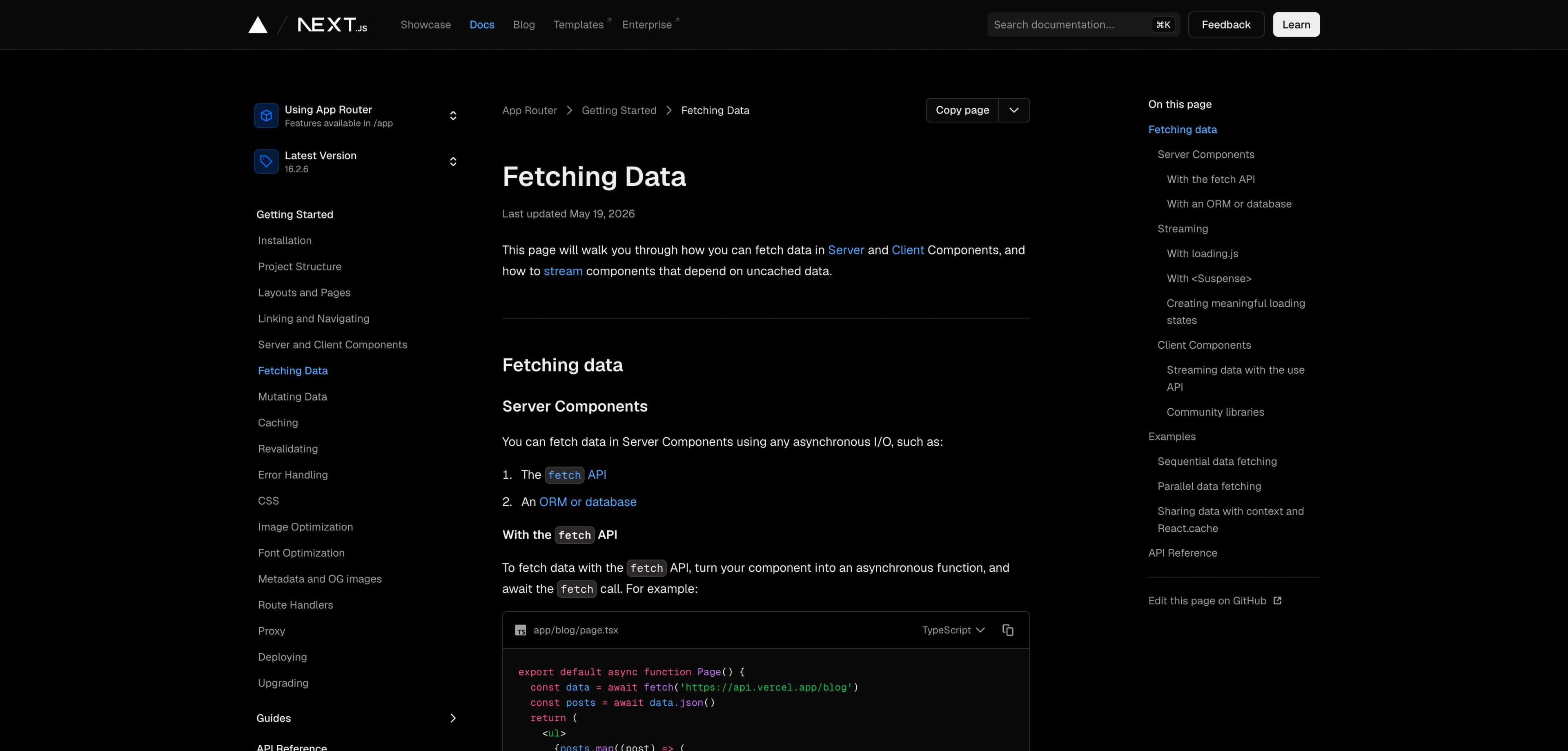 The Next.js documentation page for Fetching Data, rendered in a Chrome browser window with the full sidebar, navbar, code samples, and right-rail table of contents visible